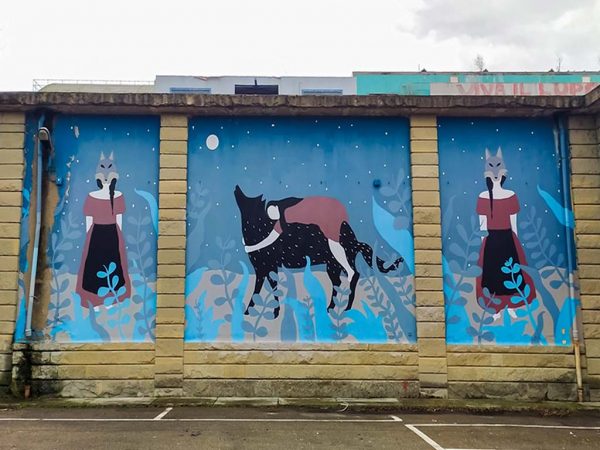 murales con lupo sulla ex cartiera di valle di reno